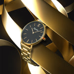 elysian-gouden-dames-horloge-zwart-plaat-goud-schakelband-horlogeband-ELYWW00126-hand