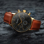 elysian-gouden-heren-horloge-zwart-plaat-bruin-klassiek-leder-horlogeband-ELYWM00113-second